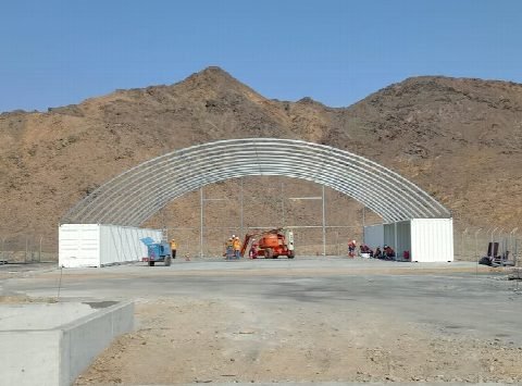 The dome frame against the mountains.