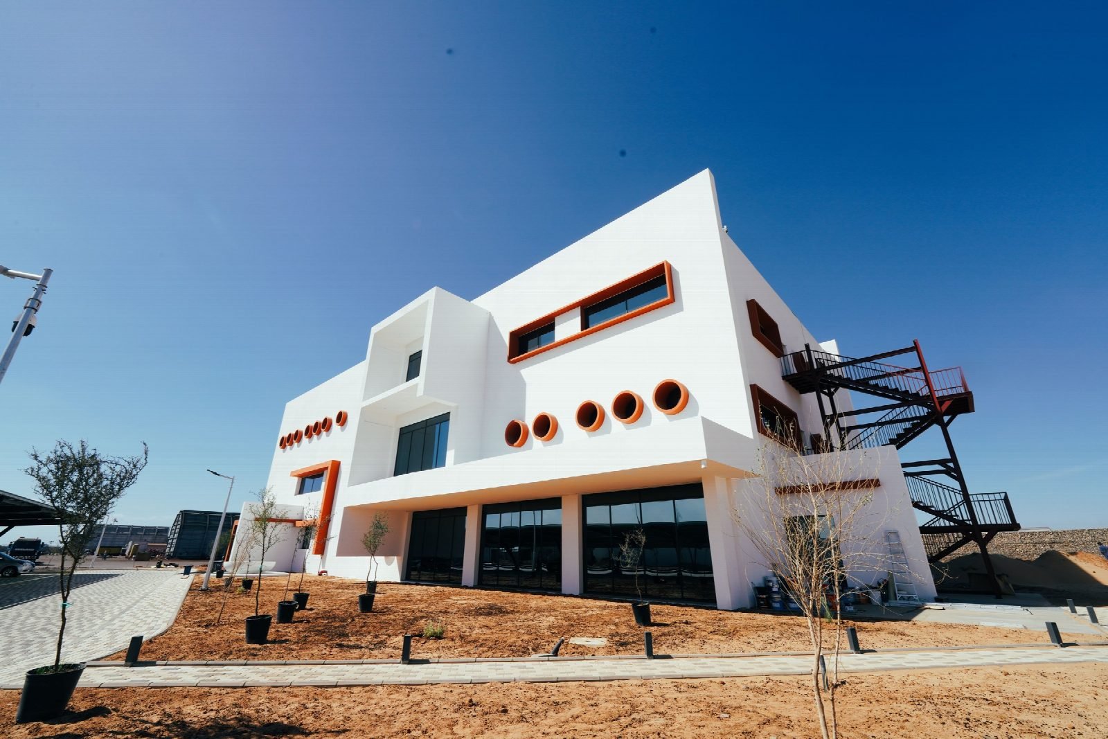 Headquarters façade with the round window openings.
